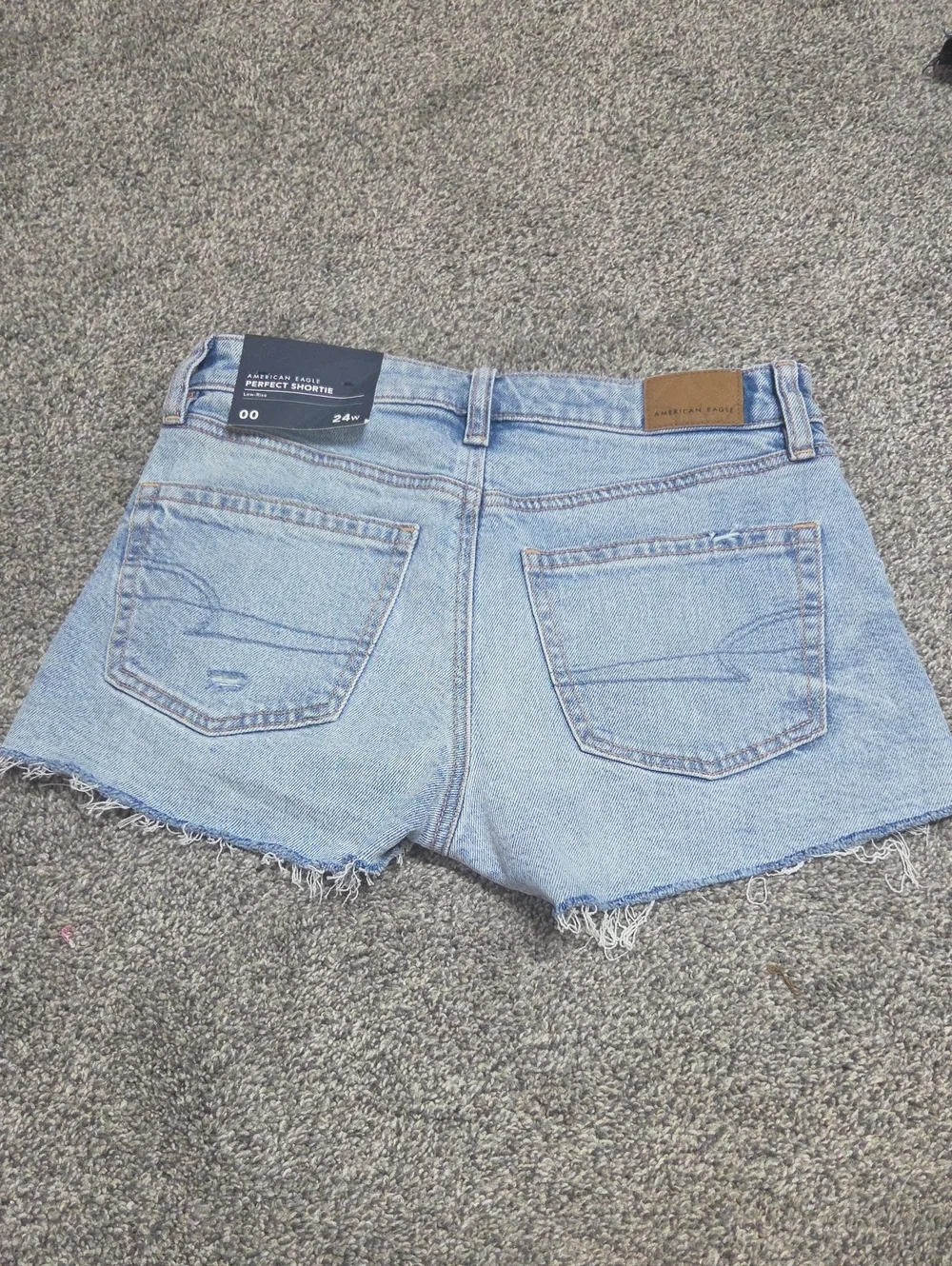Light Blue Distressed Denim Shorts - Women